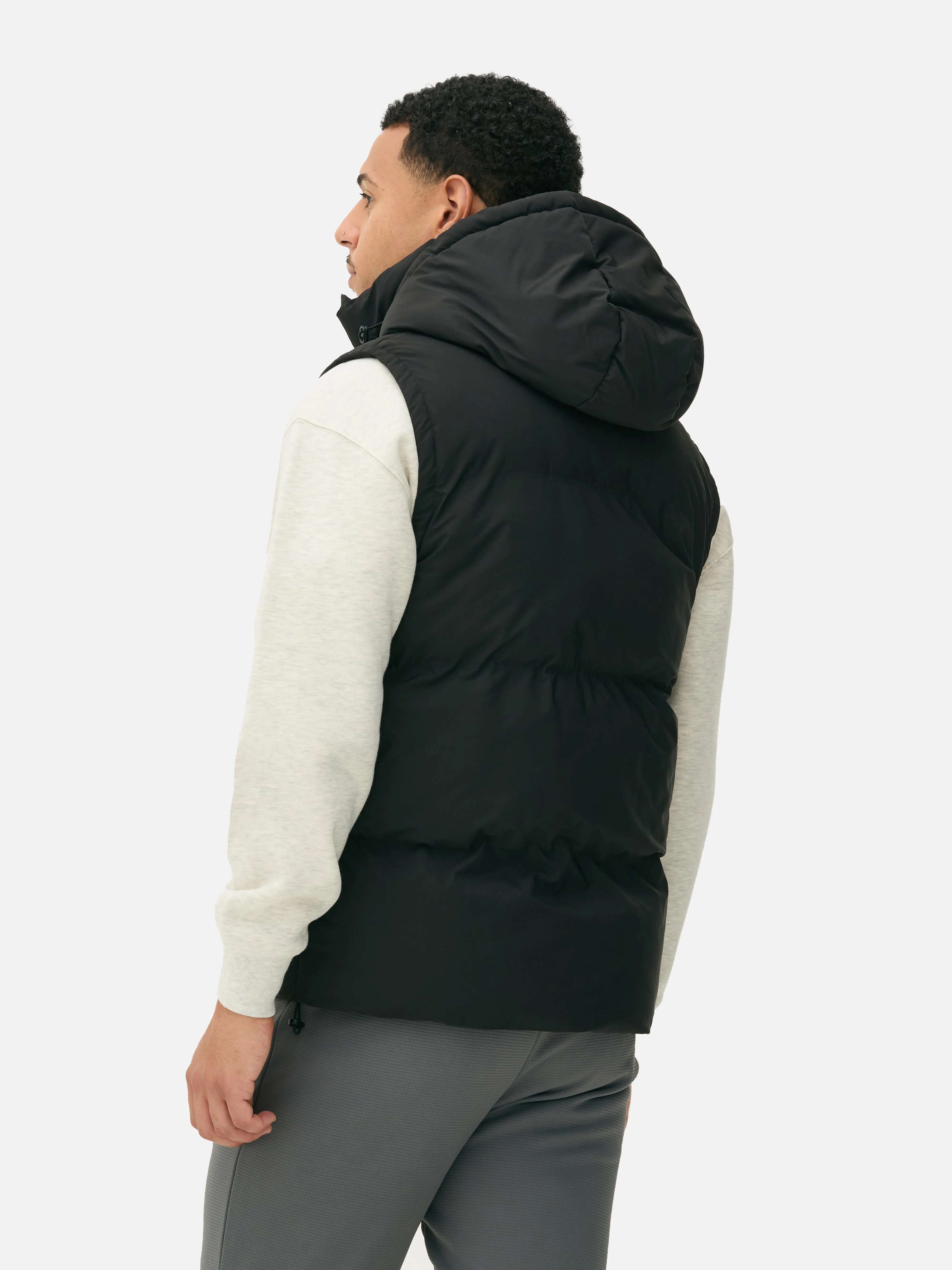 Gilet imbottito con cappuccio