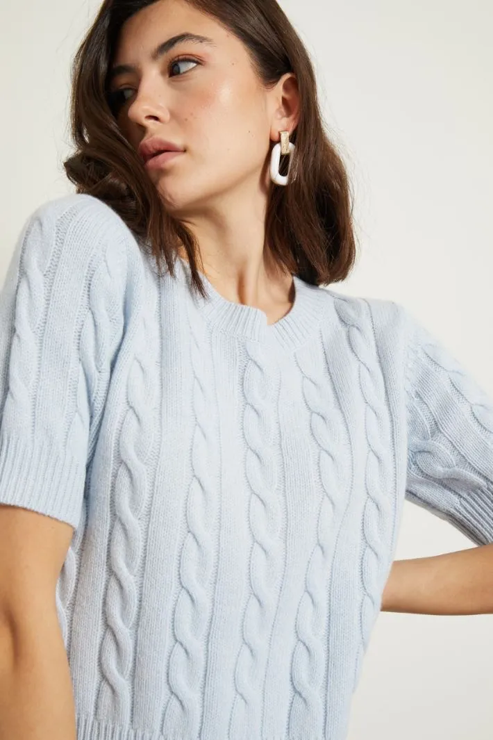 Maglia lavorata a trecce