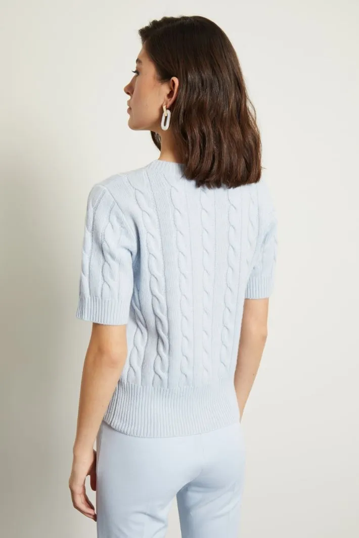 Maglia lavorata a trecce