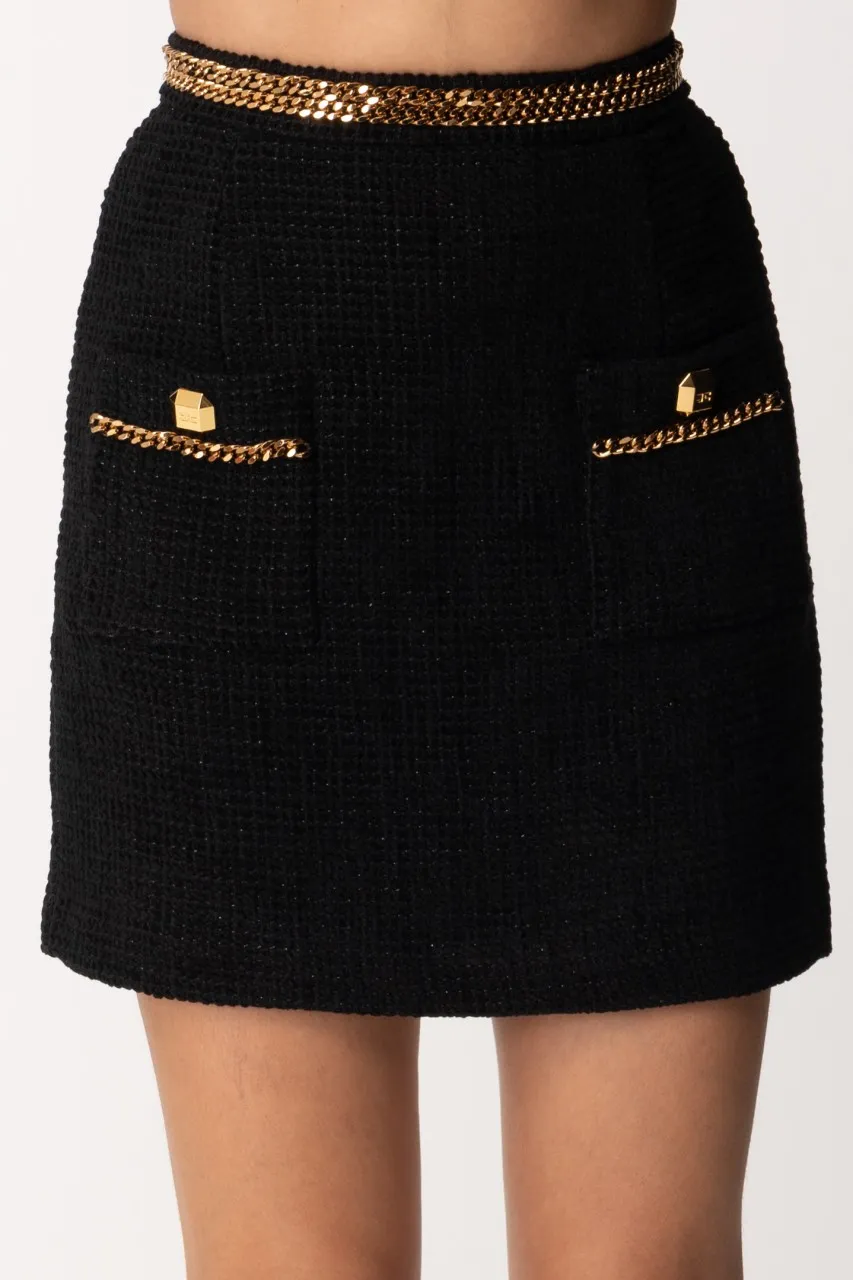 Minigonna in tweed con catena Nero