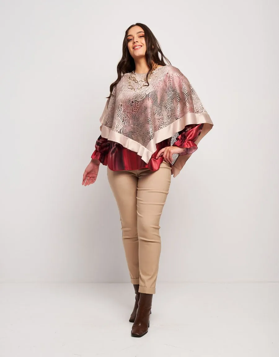 Poncho in pizzo con raso