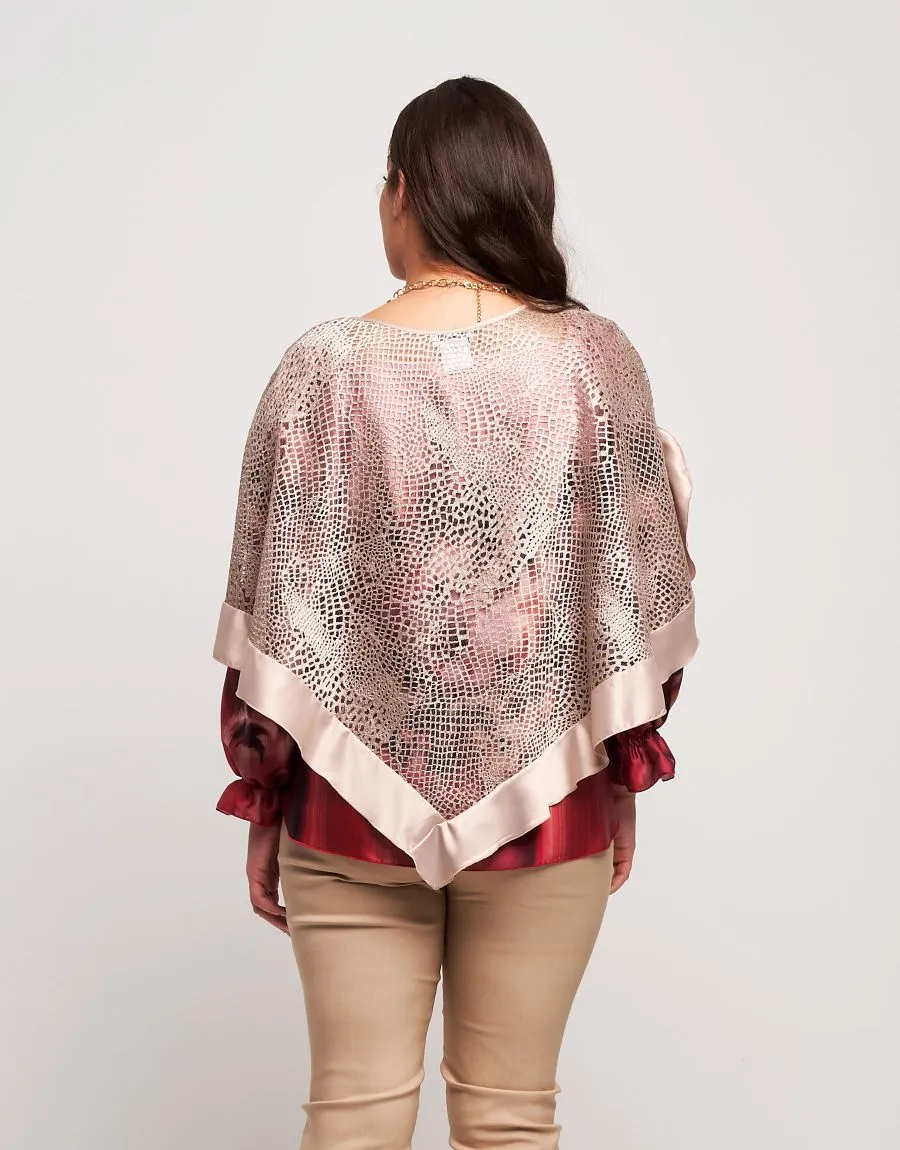 Poncho in pizzo con raso