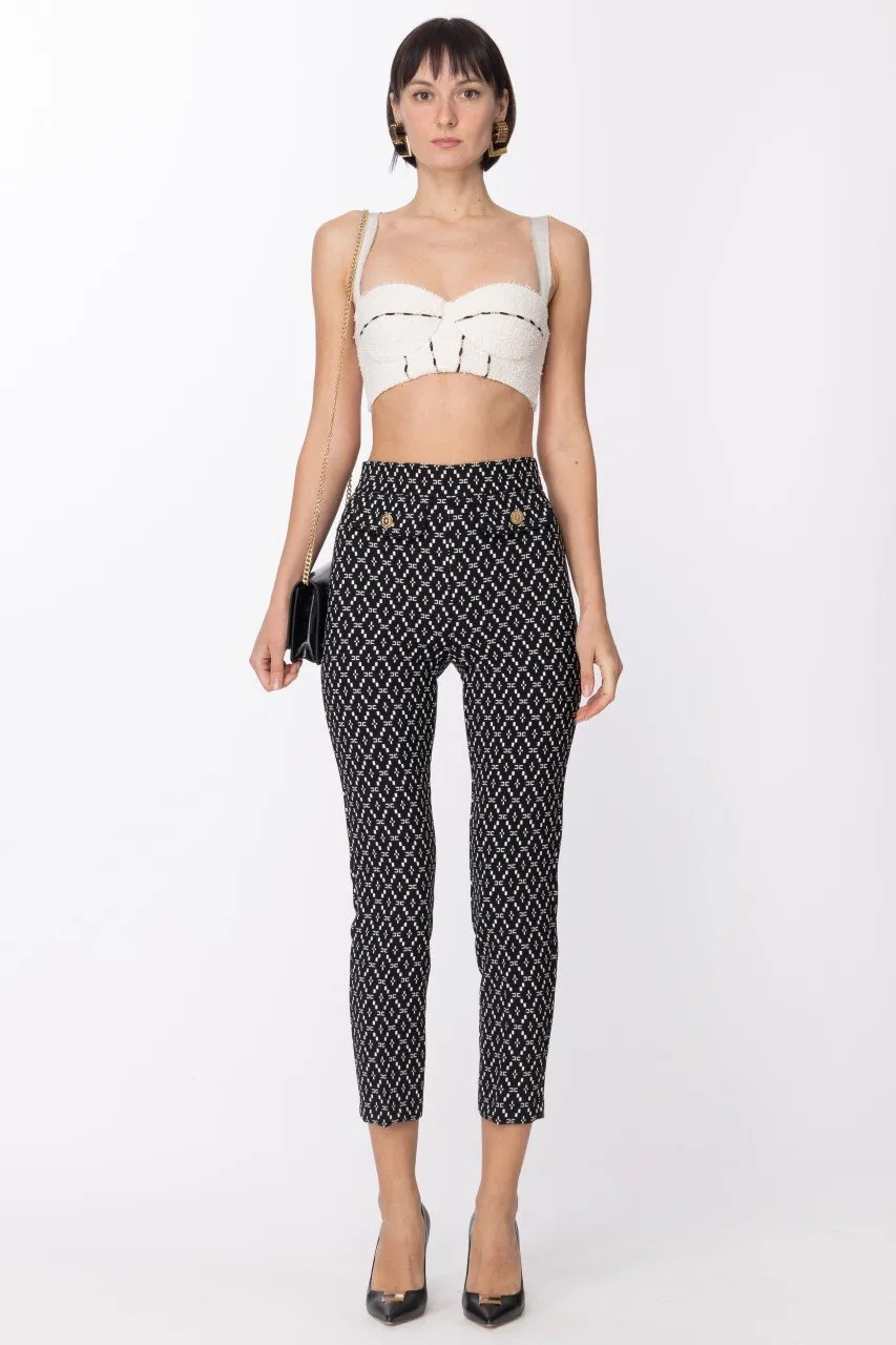 Top in tweed sfrangiato con piping Burro